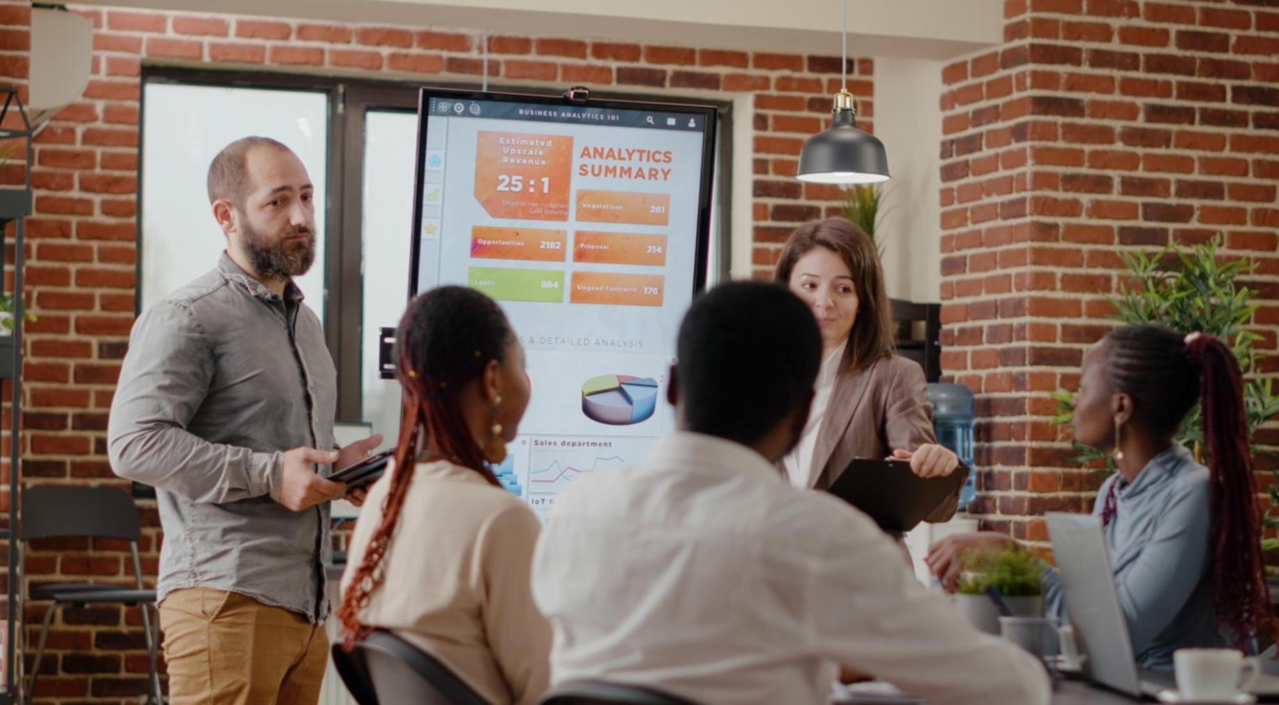 Students working on network troubleshooting lab exercises with advanced monitoring equipment